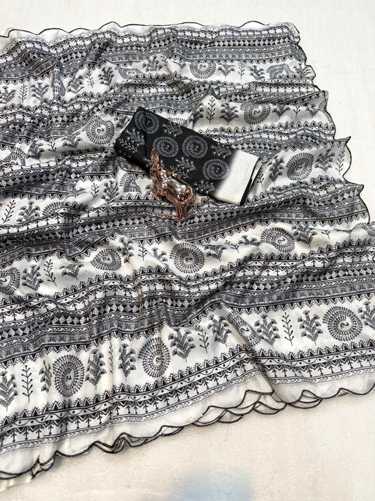 A Dola Silk Digital Warli Printed Cutwork Saree with Ikat Blouse