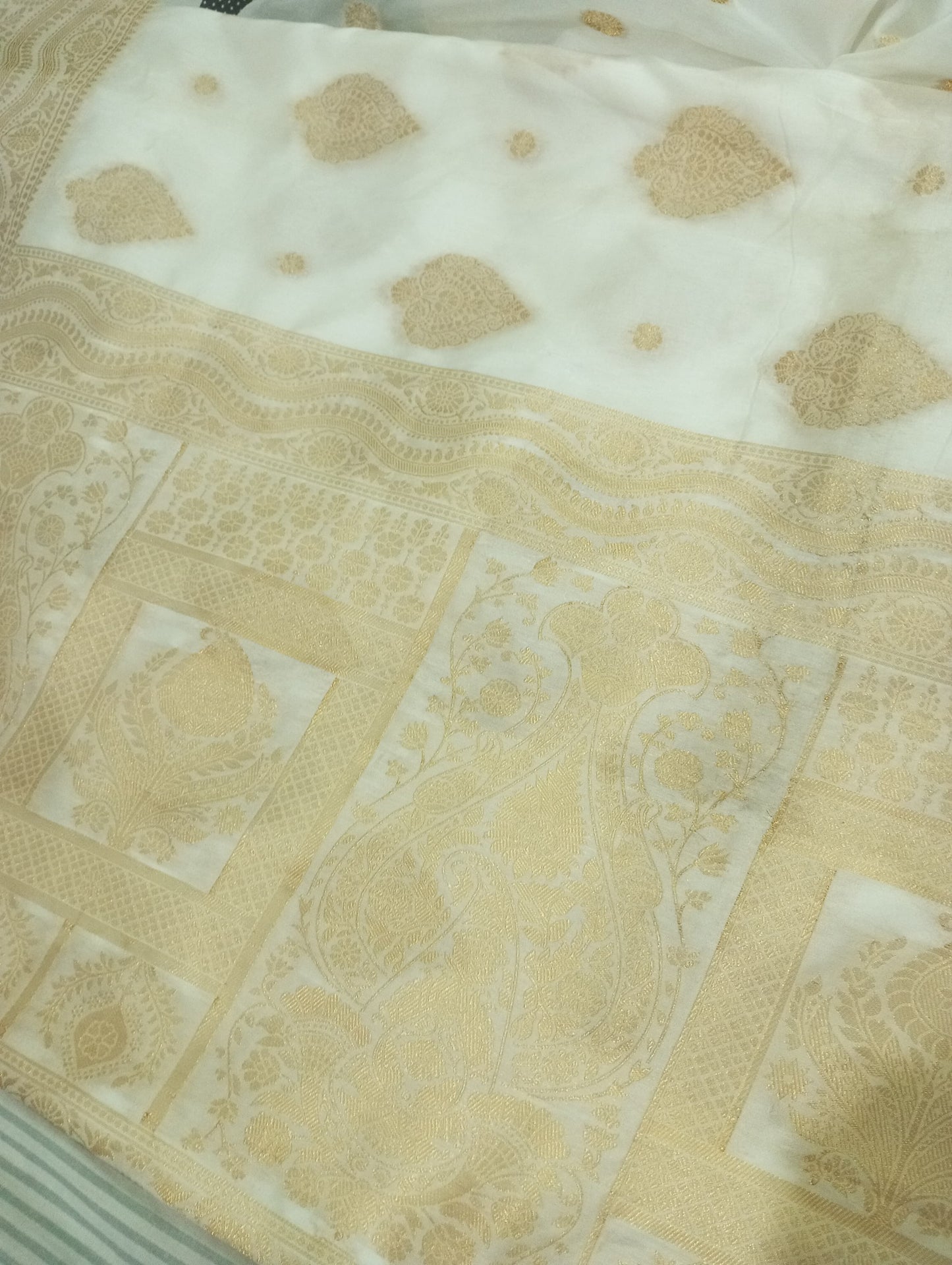 Elegant Off-White Banarasi Silk Saree with Golden Zari Work