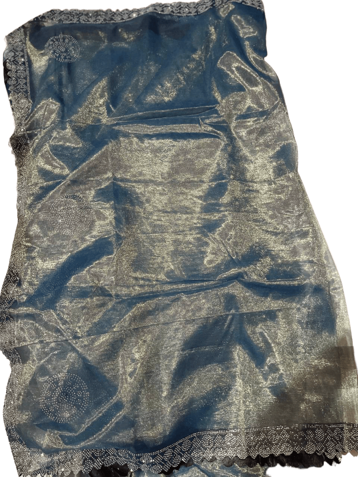Elegance with this mesmerizing grey twill net saree