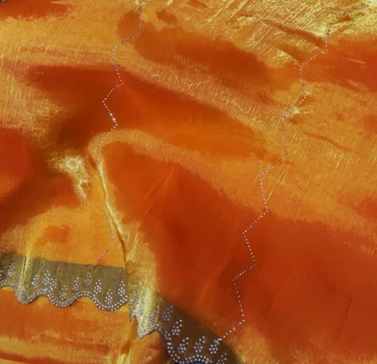 Jimmy Choo-Inspired Orange Saree with Subtle Golden Accents