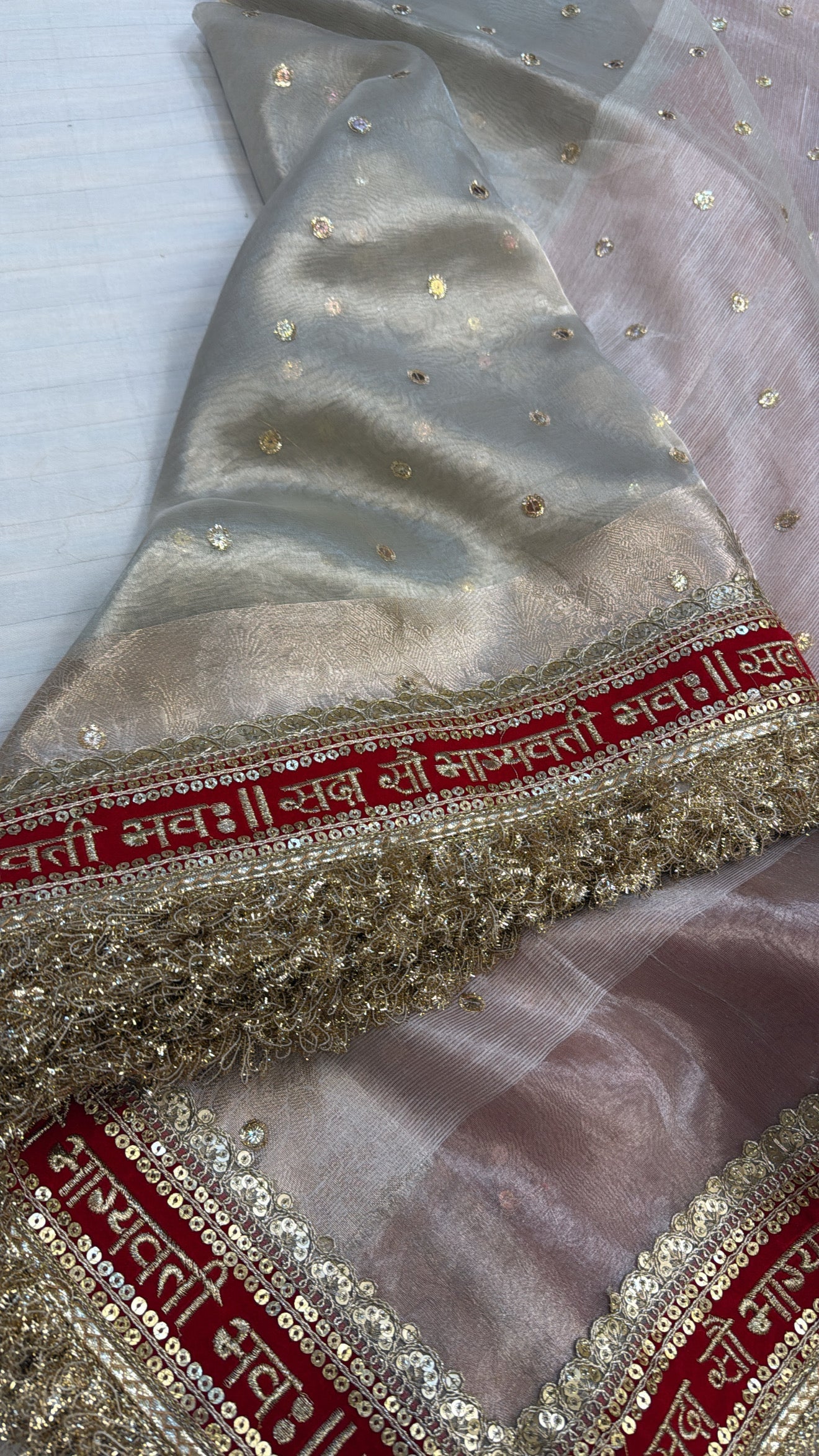 A Banarasi Premium “Sada saubhagyawati” tissue silk white-red border kadhwa saree