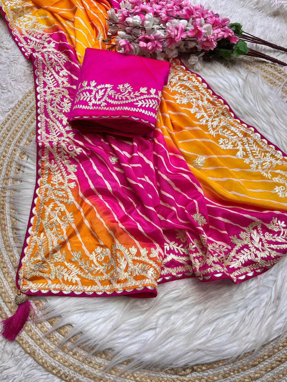 A Chinnon Fabric Digital Leheriya Saree with Ribbon Work