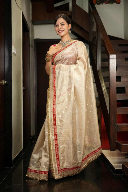A Banarasi Premium “Sada saubhagyawati” tissue silk white-red border kadhwa saree